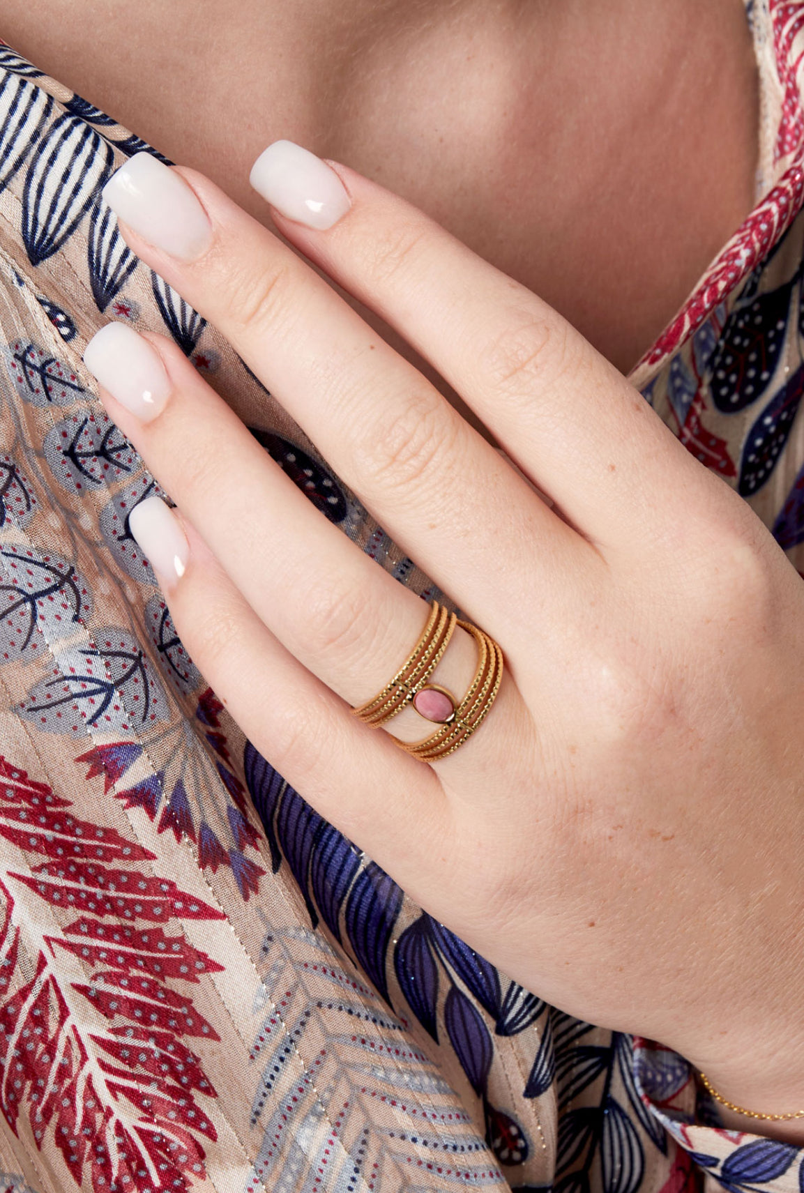 Dubbele ring met groene steen