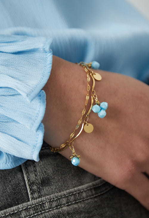 Blue charm armband